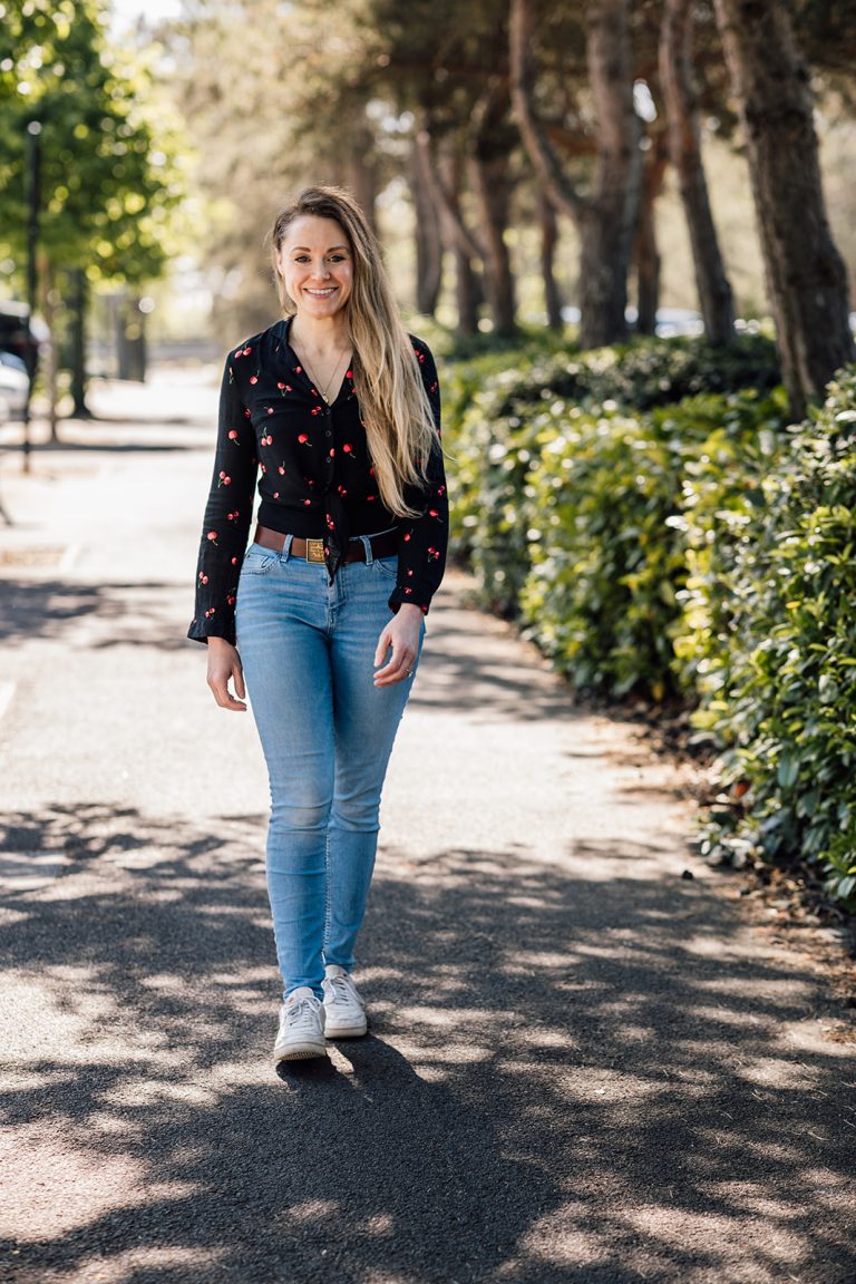 Blonde female Milton Keynes copywriter / content writer walking towards the camera